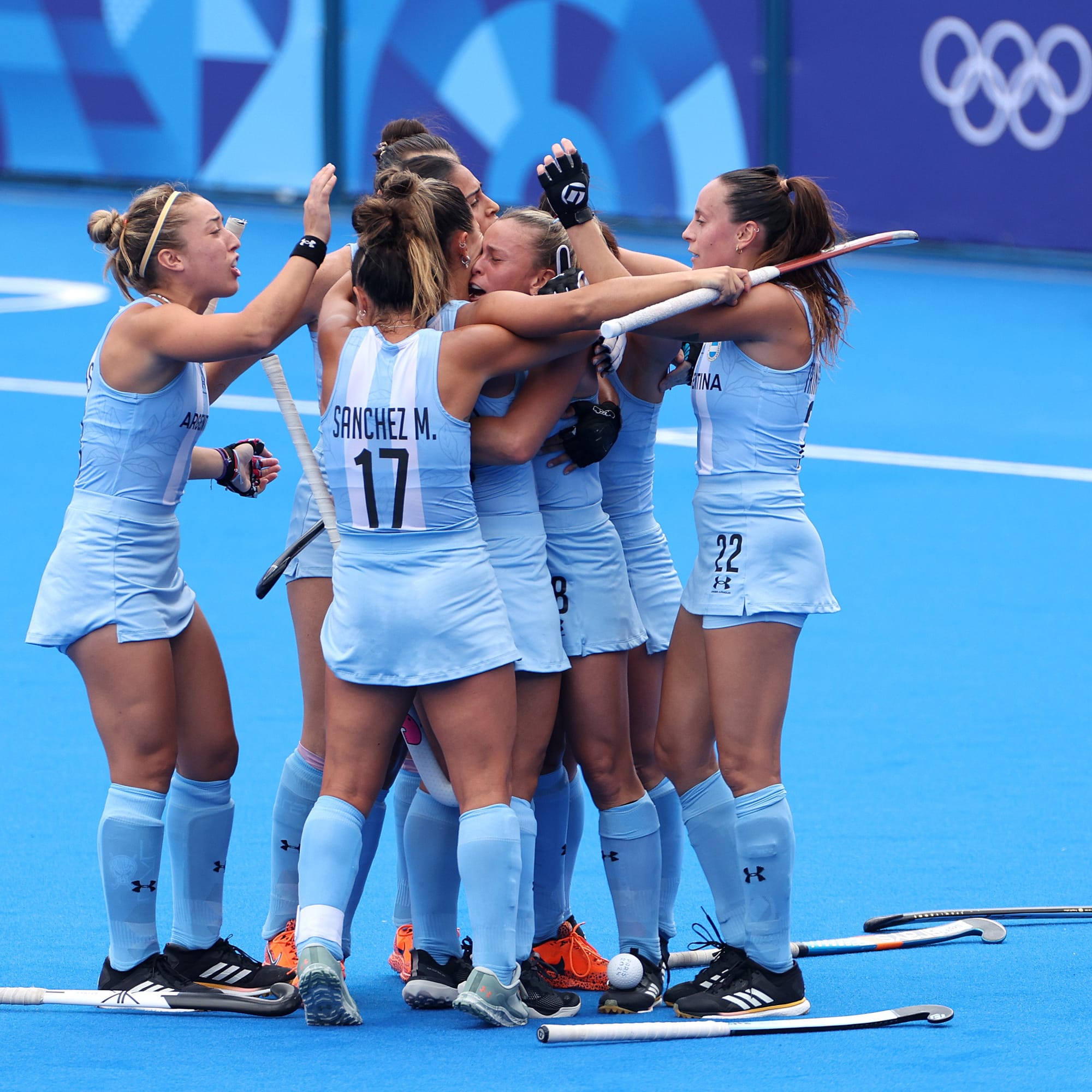 Argentina Women's Hockey Team celebrating their victory with a bronze medal at the 2024 Paris Olympics.